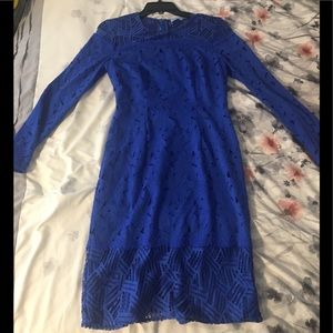 A blue lace pencil dress